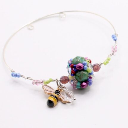 Bridge of Flowers Wire wrapped silver bracelet with bee and Swarovski crystal flower scaled