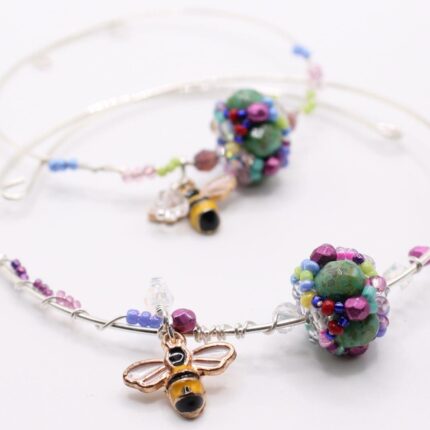 Bridge of Flowers silver wire wrapped bracelets with bee and Swarovski crystal flower scaled