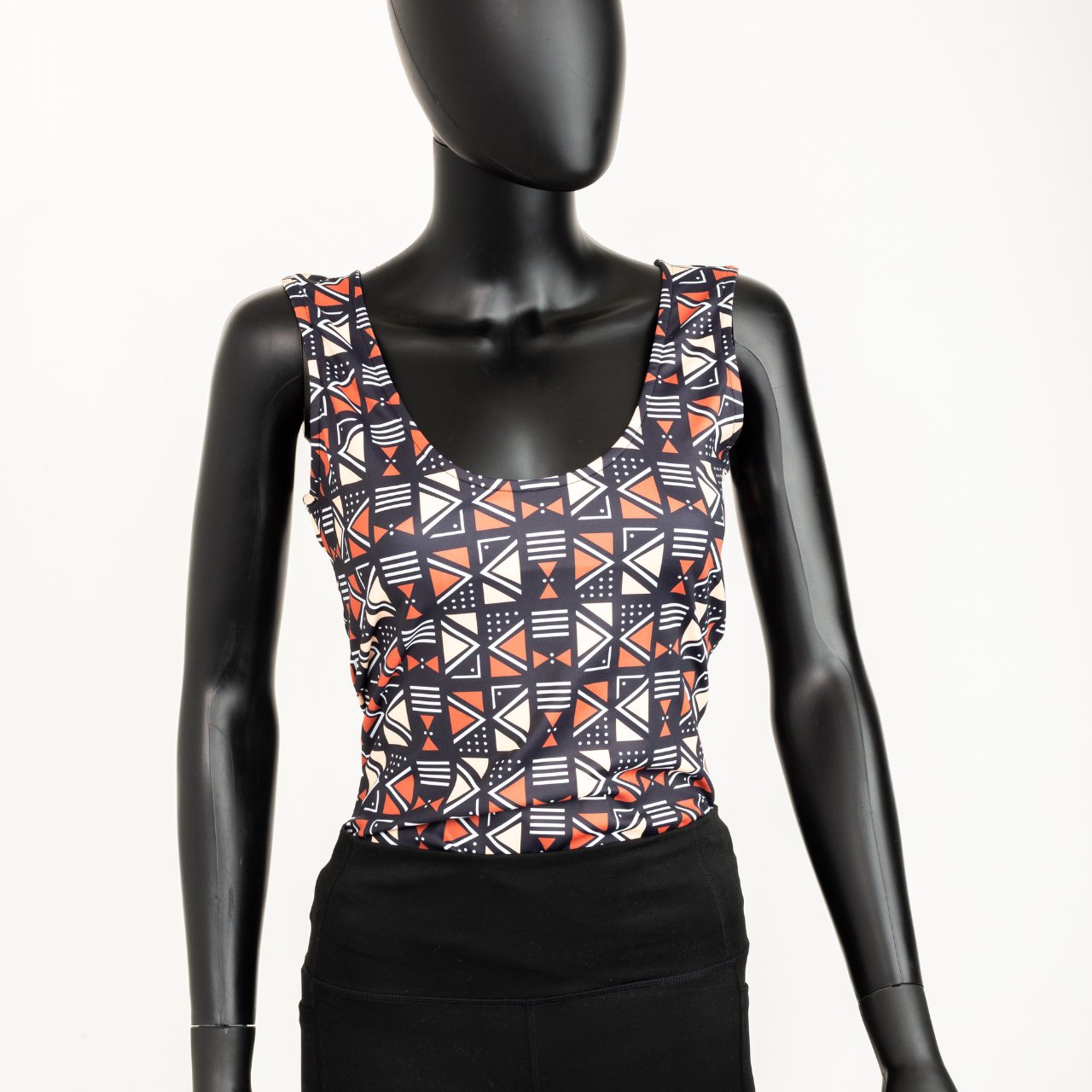 xr:d:DAFuivZHtms:83,j:7739843177060520626,t:23102612 Africana Tribal Activewear Orange Tanks - Image 1