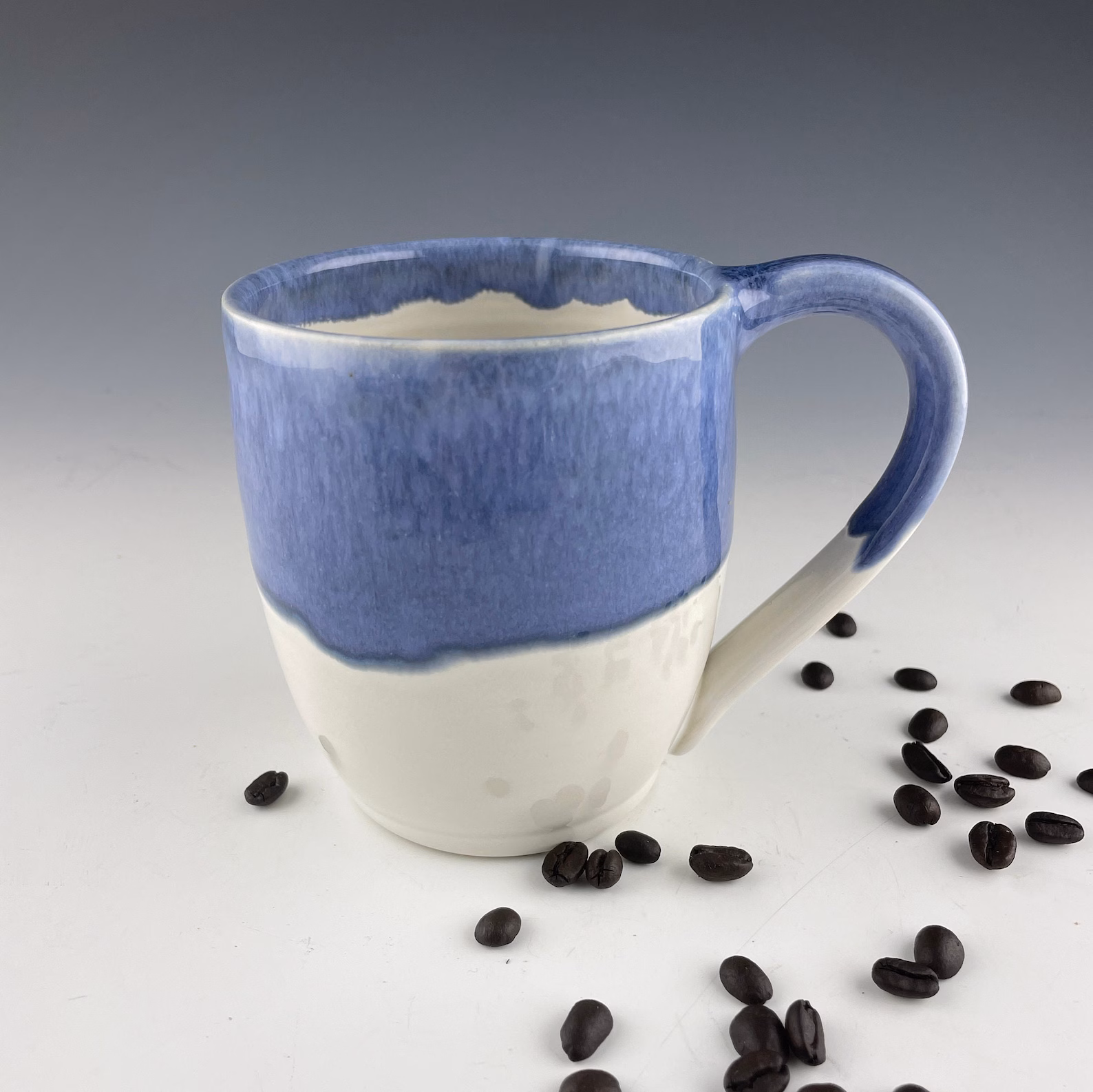 MG5 Handmade Ceramic Blue and White Mug - Image 1
